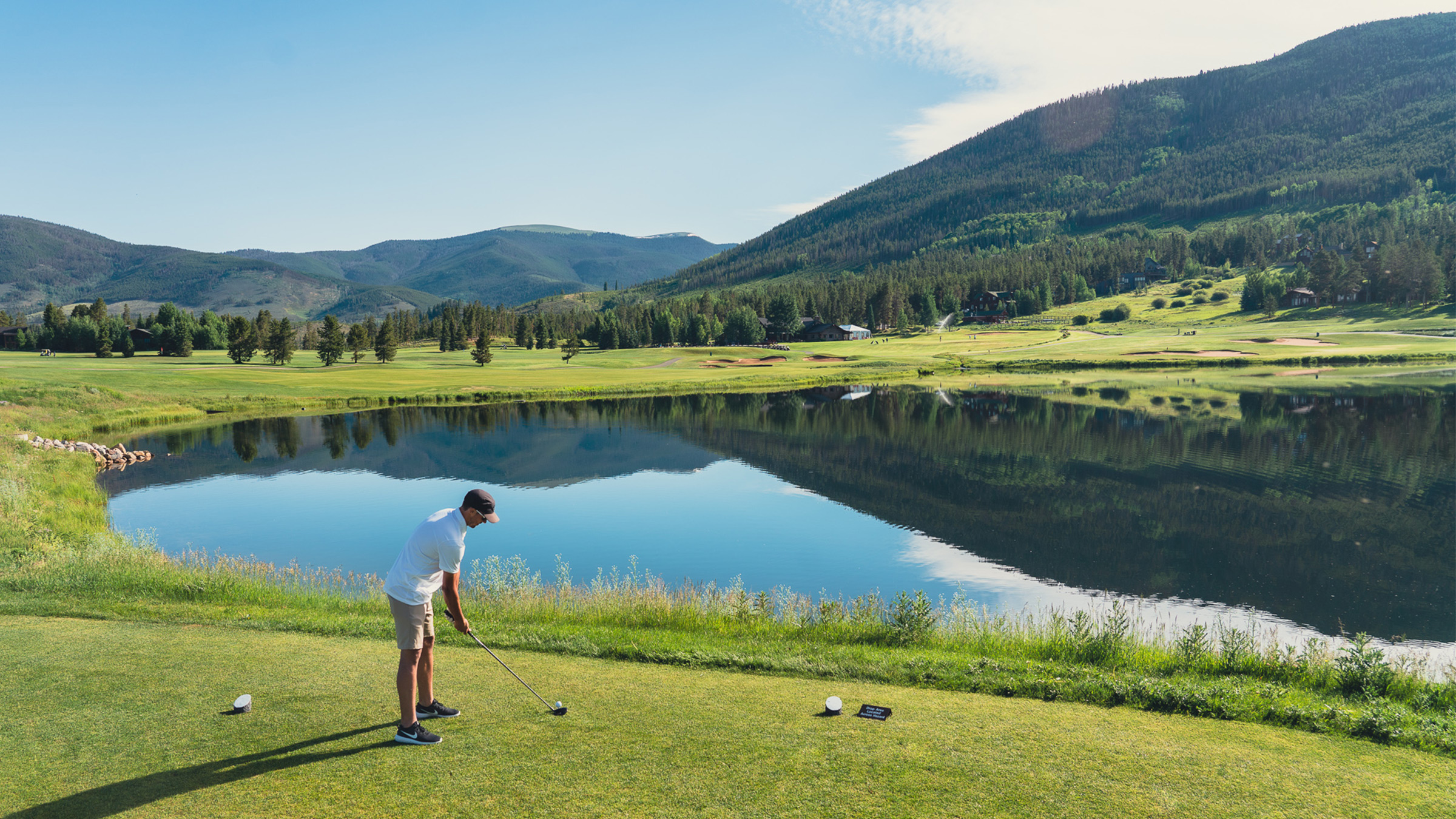 The Ranch Course winds through lodgepole pines, around sage meadows and across a nine-acre lake. 